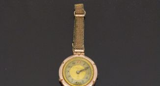 9ct gold ladies wristwatch with blued Breguet hands, two-tone face and Arabic numerals,