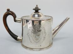 A George III hallmarked silver teapot, London 1776 maker Walter Brind, height 14cm,