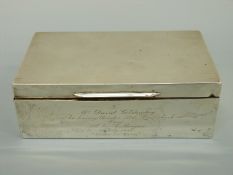 A hallmarked silver cigarette box with engine turned lid, marks rubbed, length 15.