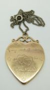 A Courtauld gold heart pendant engraved George & Claudia Courtauld 2 Juin Paris 1936.