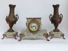 A marble clock garniture with ormolu mounts,