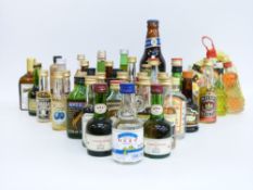 Approximately 40 alcohol miniatures to include Drambuie, Dufftown Glenlivet whisky, Sambuca,