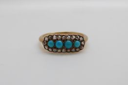 A Victorian ring set with a four turquoise cabochons surrounded by rose cut diamonds (size K)