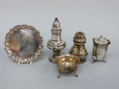 Five pieces of silver to include three pepper pots, open salt and miniature salver, diameter 8.
