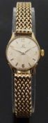 Omega 9ct gold ladies wristwatch with gold hands, baton markers and Arabic numerals,