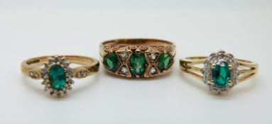 Three 9ct gold rings set with green and clear paste