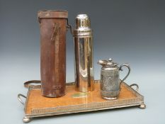 A leather cased Landers Frary & Clark 'Universal' hunting or motoring flask, height 36cm,