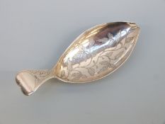 A George III hallmarked silver tea caddy spoon, Birmingham 1808 maker William Pugh,