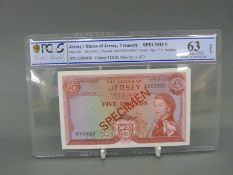 Jersey 1963 £5 specimen P9s1 gold shield grading,