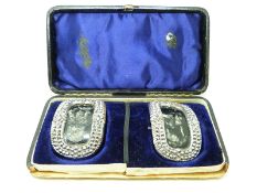 Georgian belt buckles in original box.