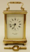 A late 20thC English brass carriage clock with enamelled dial, Roman numerals and Arabic minutes,