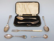 A cased hallmarked silver fork and spoon set and three further hallmarked silver spoons, weight 82g,