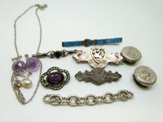 Two hallmarked Victorian silver brooches set with applied floral and swallow decoration and two