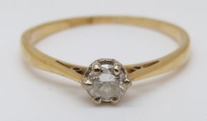 An 18ct gold ring set with a round cut diamond of approximately 0.35ct, 2.