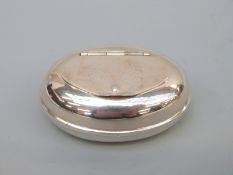 A continental white metal snuff/trinket box with engraved coronets and heraldic shields,
