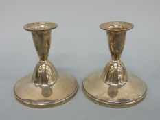 A pair of hallmarked silver squat candlesticks, Birmingham 1960 maker Adie Brothers Ltd, height 8.