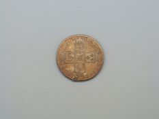 A Queen Anne half crown ex mount,