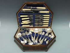 An oak cased canteen of EPNS cutlery