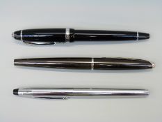 Three various Cross fountain pens.