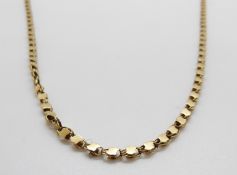 A 9ct gold necklace, 10.