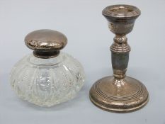A hallmarked silver candlestick,