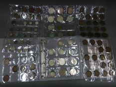 An amateur coin collection in an album including a good mix of UK silver, a George II crown,