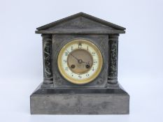 A late 19thC French slate and marble mantel clock,