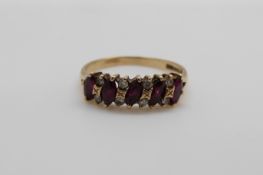 A 9ct gold ring set with rubies and diamonds, 2.