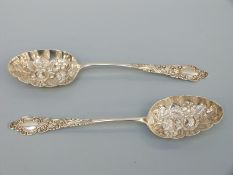 A Victorian/Edward VII pair of hallmarked silver berry spoons Birmingham 1901,