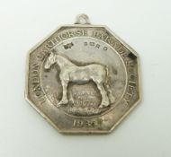 A hallmarked silver medallion for the London Carthorse Parade Society 1935, 3.5 x 3.