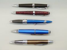 Five various Cross ballpoint pens.