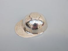 A hallmarked silver tea caddy spoon in the form of a jockey's cap, London 1982 maker's mark DSS,