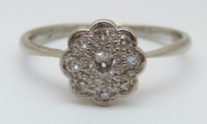 An 18ct white gold ring set with diamonds in a cluster (size R)