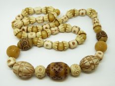 A carved African beaded necklace