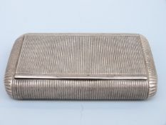 A 19thC French reeded white metal snuff box with French silver marks circa 1819-38, length 8.