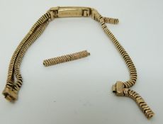 A 9ct gold watch strap (11.