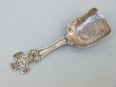 A George VI hallmarked silver caddy spoon with cruciform handle with Celtic knot design,