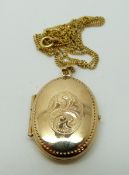A 9ct gold locket and chain, 4.