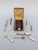 Five various hallmarked silver and mother of pearl folding fruit knives,