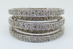 A 9ct white gold ring set with diamonds in layered bands, total diamond weight approximately 1ct, 7.