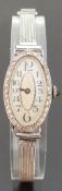 Art Deco Cartier style platinum ladies cocktail wristwatch with Arabic numerals,