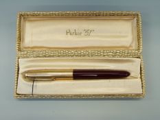 Parker 51 fountain pen in box with rolled gold cap and maroon body