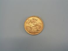 A 1903 gold sovereign,