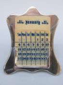 A hallmarked silver perpetual calendar, Chester 1922 maker's mark C&S,