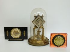 Three mid twentieth century clocks comprising Kundo anniversary example,