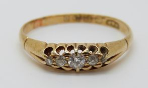 An 18ct gold ring set with five diamonds, Chester 1897, 2.