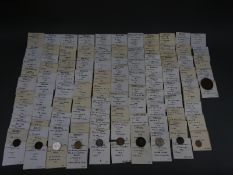 A collection of world coinage, catalogued in envelopes, includes USA, Holland,