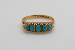 An 18ct gold ring set with five turquoise cabochons in a Cheltenham box,