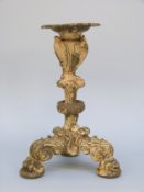 A 19thC ornate bronze / brass candlestick,