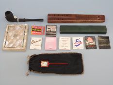 Mother of pearl card case, Irish bogwood pipe, a cut throat razor by Truefitt,